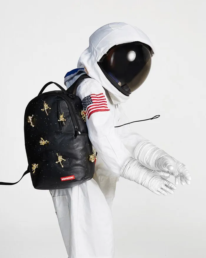 SPRAYGROUND Backpacks THE LOST IN SPACE BACKPACK 10 3D GOLD METAL ASTRONAUTS 8211 Universal SPRAYGROUND Backpacks THE LOST IN SPACE BACKPACK 10 3D GOLD METAL ASTRONAUTS 8211 Universal